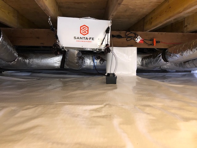 Encapsulated crawlspace with a dehumidifier after mold remediation